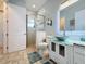 Bathroom with glass shower, vanity, and toilet at 3301 Buckingham Way, St Cloud, FL 34772