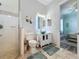 Clean bathroom with glass shower and modern vanity at 3301 Buckingham Way, St Cloud, FL 34772