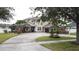 Beautiful two story home with stone accents and landscaping at 3301 Buckingham Way, St Cloud, FL 34772