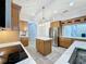 Spacious kitchen with wood cabinets and granite countertops at 3301 Buckingham Way, St Cloud, FL 34772