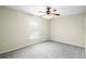Spacious bedroom with ceiling fan and carpet at 3621 Ronda Dr, Deltona, FL 32738
