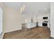 Modern kitchen with white cabinets, stainless steel appliances, and an island at 415 Big Sioux Ct, Kissimmee, FL 34759