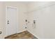 Laundry room with shelving and hookups for washer/dryer at 415 Big Sioux Ct, Kissimmee, FL 34759