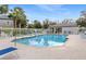 Community pool with lounge chairs and cabana at 427 Tradition Ln, Winter Springs, FL 32708