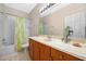 Clean bathroom with a shower/tub combo and wood vanity at 4459 Twinview Ln, Orlando, FL 32814
