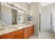 Double vanity bathroom with a large mirror and plenty of counter space at 4459 Twinview Ln, Orlando, FL 32814