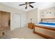 Bright bedroom featuring a double bed and ceiling fan at 4459 Twinview Ln, Orlando, FL 32814