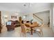Bright dining area with a wooden table and wicker chairs at 4459 Twinview Ln, Orlando, FL 32814