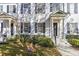 Two townhouses with gray shutters and columns at 4459 Twinview Ln, Orlando, FL 32814