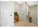 Upstairs hallway with carpet flooring and built-in bookshelf at 4459 Twinview Ln, Orlando, FL 32814
