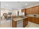 Well-equipped kitchen with ample counter space, wood cabinets, and stainless steel appliances at 4459 Twinview Ln, Orlando, FL 32814