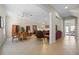 Spacious living room with leather furniture and a large window at 4459 Twinview Ln, Orlando, FL 32814