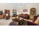 Relaxing living room with leather seating and a coffee table at 4459 Twinview Ln, Orlando, FL 32814