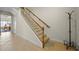 Wooden staircase with white railing at 4459 Twinview Ln, Orlando, FL 32814