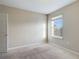 Bright bedroom with window and carpet at 4775 Terrasonesta Dr, Davenport, FL 33837