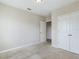 Well-lit bedroom with double-door closet at 4775 Terrasonesta Dr, Davenport, FL 33837
