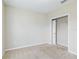Empty bedroom with closet and carpet at 4775 Terrasonesta Dr, Davenport, FL 33837