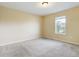 Spacious bedroom with neutral walls and carpet at 4775 Terrasonesta Dr, Davenport, FL 33837