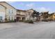 Row of townhouses with parking and neat landscaping at 4775 Terrasonesta Dr, Davenport, FL 33837