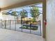 Enclosed pool area with safety fence and covered patio at 4775 Terrasonesta Dr, Davenport, FL 33837