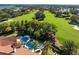 Luxury home with pool and spa overlooking a lush golf course at 5271 Isleworth Country Club Drive, Windermere, FL 34786