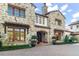 Elegant stone house with a large front entryway and manicured landscaping at 5271 Isleworth Country Club Drive, Windermere, FL 34786
