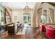 Game room with bar, seating area, and access to backyard at 5271 Isleworth Country Club Drive, Windermere, FL 34786