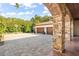 Spacious three-car garage with paver driveway at 5271 Isleworth Country Club Drive, Windermere, FL 34786