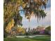 Serene golf course with moss-draped oaks at 5271 Isleworth Country Club Drive, Windermere, FL 34786