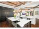 Large kitchen with island, farmhouse sink, and custom cabinetry at 5271 Isleworth Country Club Drive, Windermere, FL 34786