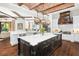 Open kitchen with large island, double sink, and breakfast bar at 5271 Isleworth Country Club Drive, Windermere, FL 34786