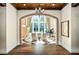 Spacious living room with high ceilings, fireplace, and large windows at 5271 Isleworth Country Club Drive, Windermere, FL 34786
