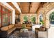 Relaxing patio with seating area, outdoor kitchen and view of pool at 5271 Isleworth Country Club Drive, Windermere, FL 34786