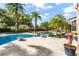 Expansive pool and patio area with fire pits and landscaping at 5271 Isleworth Country Club Drive, Windermere, FL 34786