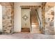 Elegant stone staircase leading to upper level at 5271 Isleworth Country Club Drive, Windermere, FL 34786