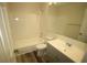 Clean bathroom, includes a shower/tub combo and vanity at 7524 Seurate #12208 St # 12208, Orlando, FL 32819