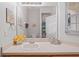 Bathroom with single sink vanity and mirrored medicine cabinet at 8443 Crystal Cove Loop, Kissimmee, FL 34747
