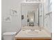 Clean bathroom with single sink vanity, toilet, and shower/tub combo at 8443 Crystal Cove Loop, Kissimmee, FL 34747