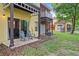 Private patio with two gray chairs, providing a relaxing outdoor space at 8443 Crystal Cove Loop, Kissimmee, FL 34747