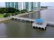 Private waterfront dock with gazebo and seating area at 231 Riverside Drive # 509-1, Holly Hill, FL 32117