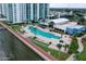 Resort-style pool with clubhouse and waterfront views at 231 Riverside Drive # 509-1, Holly Hill, FL 32117