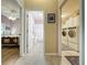 Hallway with access to bedrooms, bathroom and laundry room at 25001 Cranes Roost Cir, Leesburg, FL 34748