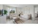 Bright living room featuring beige sofas, a coffee table, and large windows at 3869 Rory Pond Ct, Lakeland, FL 33811