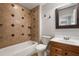 Clean bathroom with tub shower combination and wood vanity at 458 Canary Island Cir, Davenport, FL 33837