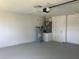Spacious garage with automatic door opener and ample storage at 5241 Magnolia Ter, Fruitland Park, FL 34731