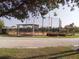 Community baseball field with dugouts and bleachers at 573 Lago Matisse St, Kissimmee, FL 34759