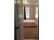 Well-lit bedroom with neutral decor and carpet flooring at 573 Lago Matisse St, Kissimmee, FL 34759