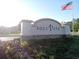 Solvita community entrance with welcoming signage at 573 Lago Matisse St, Kissimmee, FL 34759