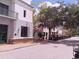 Scenic street view of charming buildings and parked golf carts at 573 Lago Matisse St, Kissimmee, FL 34759