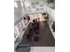 Upper level view of fitness center with weight machines at 573 Lago Matisse St, Kissimmee, FL 34759